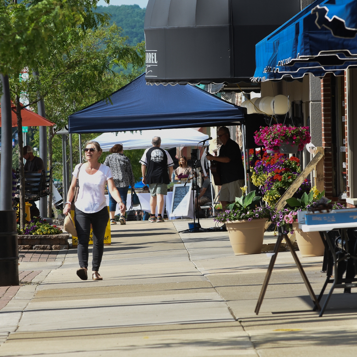 Person enjoying a stroll through walkable Olean 