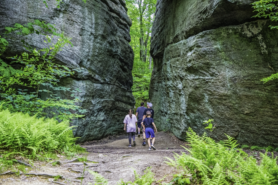 Family walking through Rock City Park