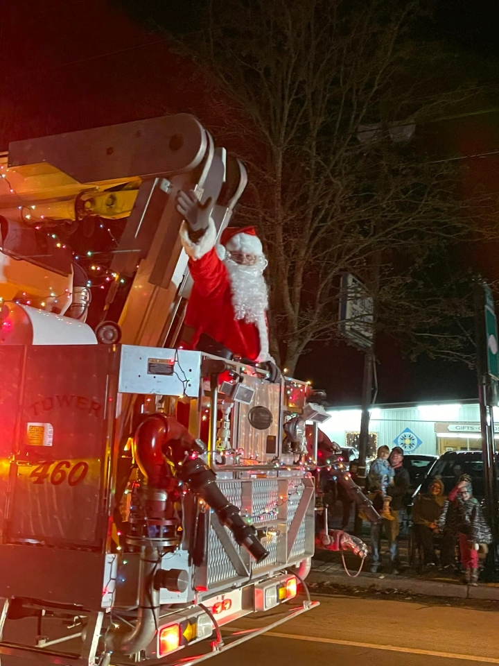 Santa waving during parade in Randolph