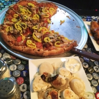 Pizza and perogies from The Broken Wing Pizzeria and Grille