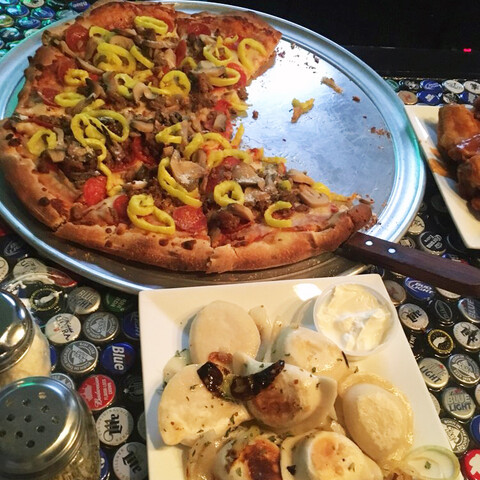 Pizza and perogies from The Broken Wing Pizzeria and Grille